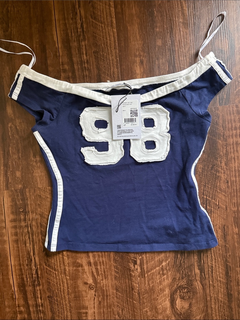 Princess Polly Navy Off-Shoulder Crop Top with White 98 Patch